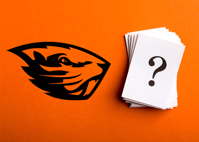 OSU Beaver with a deck of cards
