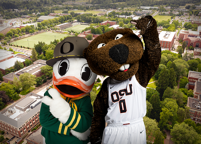Benny Beaver and the Duck pose for the camera then superimposed over aerial image of Corvallis campus