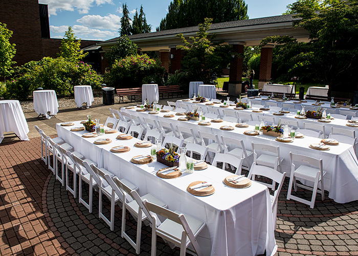 Photo of tables set for an outdoor event