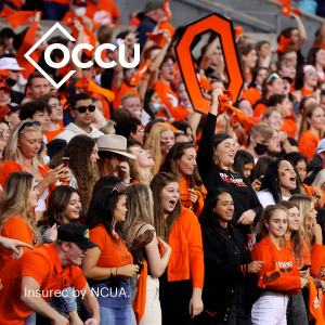 OCCU logo over a photo of Beaver fans cheering in Reser Satdium