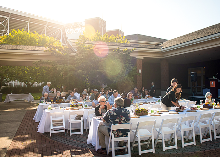 Photo of an event with guests on the OSUAC patio